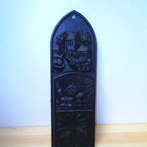 Wandrelief mit Dorf Motiv schwarzer Guss.